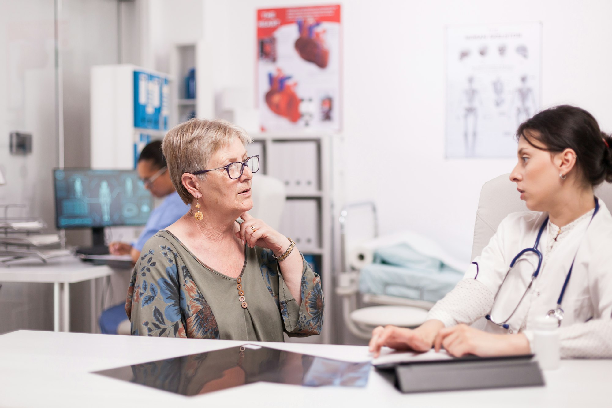 Senior woman discussing about neck pain